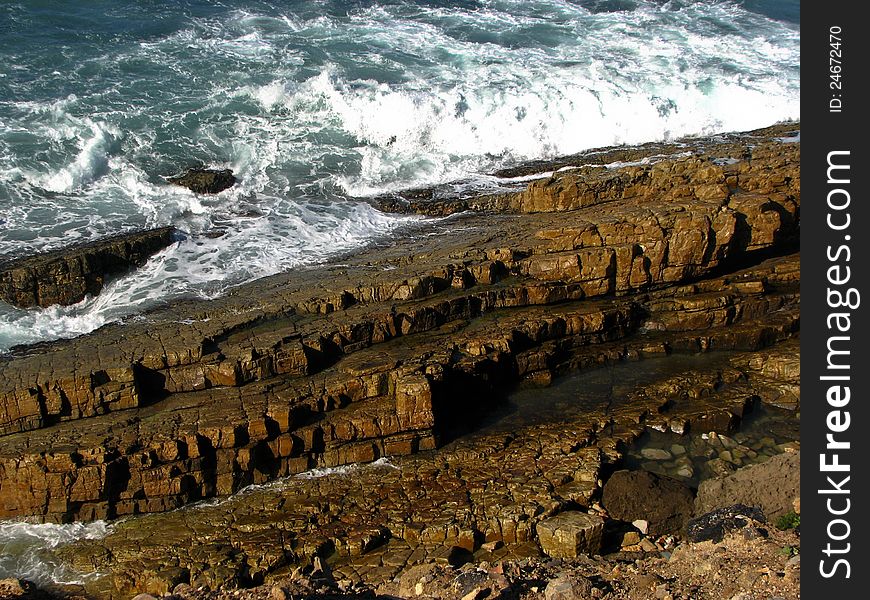 Sea scenery with a rock