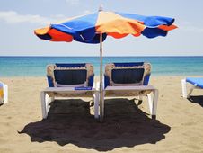 Beach Umbrella And Deckchairs Royalty Free Stock Image Beach Umbrella And Deckchairs Royalty Free Stock Image