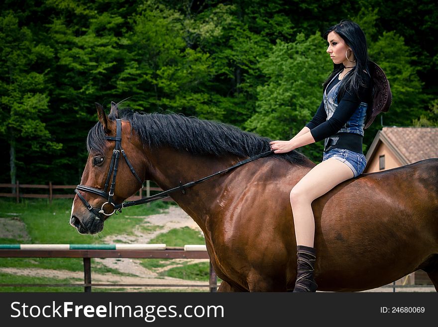 Cute Girl Riding A Horse