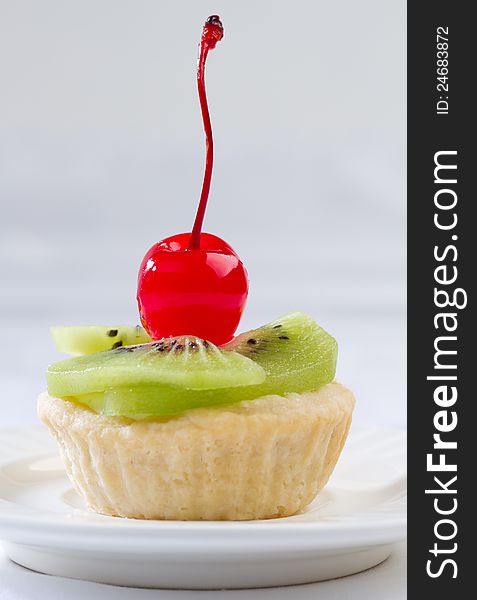 Sweet kiwi and cherry fruity tart