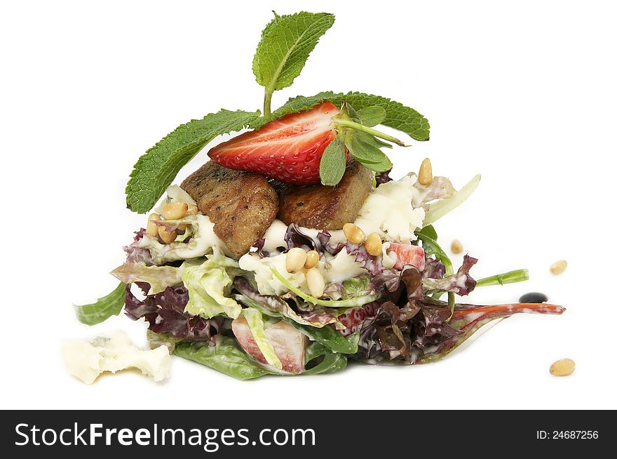 Salad of meat and greens adorned with strawberries. Salad of meat and greens adorned with strawberries