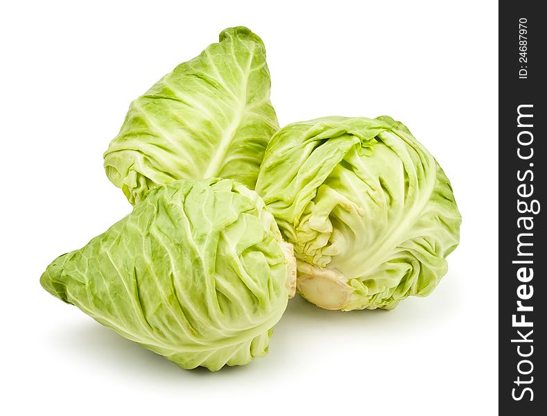 Three cabbages against white background