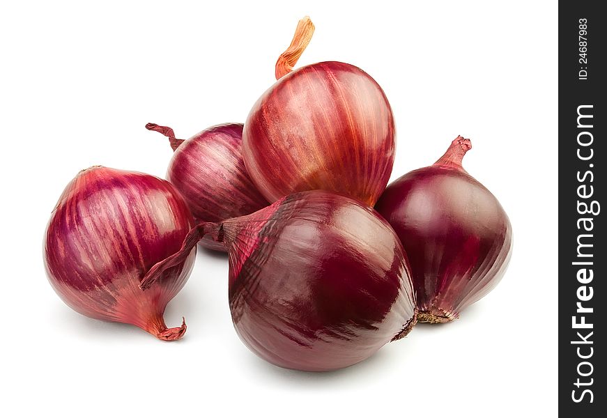 Five red onions against white background