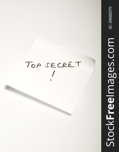 Top secret printed post-it note. Top secret printed post-it note