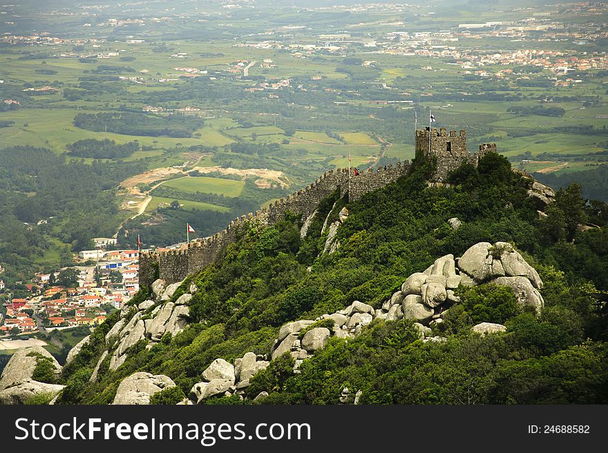 View of the Moors Castle from Palacio da Pena in Sintra, near Lisbon in Portugal. This castle dates from the IXth century and is part of the Cultural Landscape of Sintra (Portugal), recognised as an UNESCO World Heritage Site since 1995. View of the Moors Castle from Palacio da Pena in Sintra, near Lisbon in Portugal. This castle dates from the IXth century and is part of the Cultural Landscape of Sintra (Portugal), recognised as an UNESCO World Heritage Site since 1995.