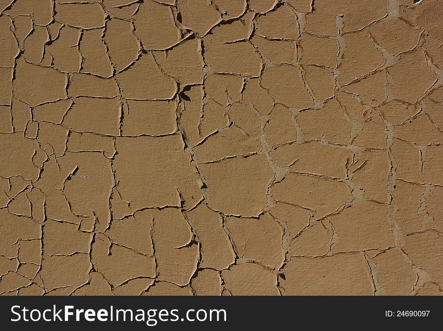 Cracked wall background close-up. Cracked wall background close-up