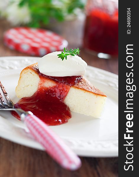 Cottage cheese cake with strawberry jam, selective focus