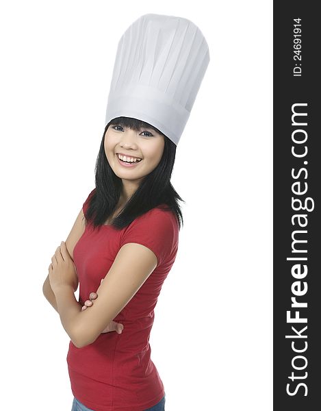 Beautiful asian young chef isolated over white background