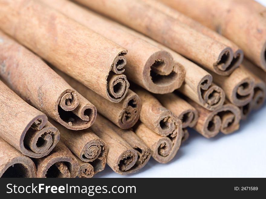 A whole bunch of cinnamon sticks - close-up.