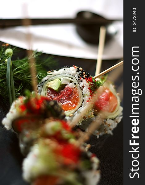 Sushi Roll sliced and skewered individually. Sushi Roll sliced and skewered individually