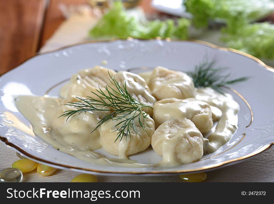 Noodle with creamy dressing on the white plate. Noodle with creamy dressing on the white plate