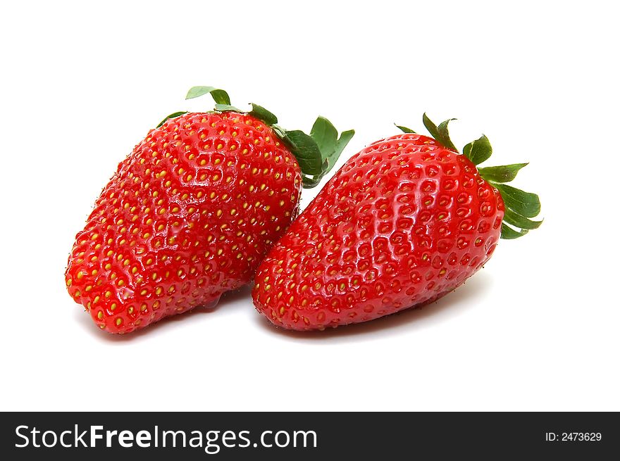 Two delicious Strawberries on a white background