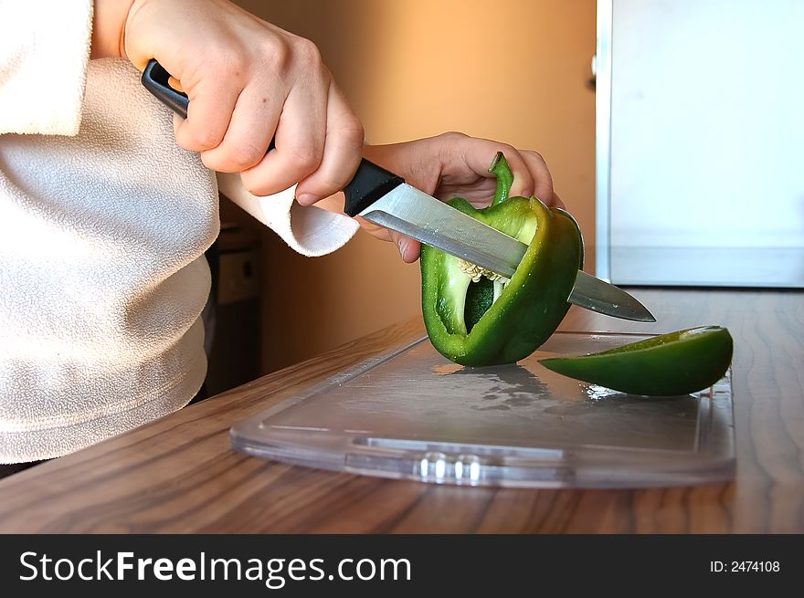 Pepper cutting in a trendy kitchen