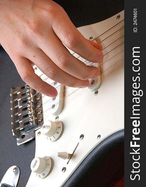 Playing Guitar-closeup