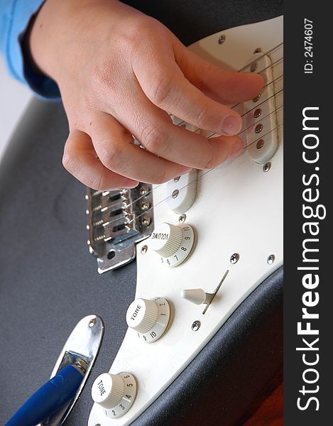 Woman Playing the guitar - closeup. Woman Playing the guitar - closeup