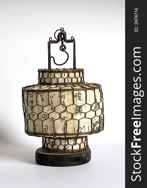 Antique Chinese Lamp. Burnished metal lamp with  characters representing Joy, Peace, Love and Harmony.