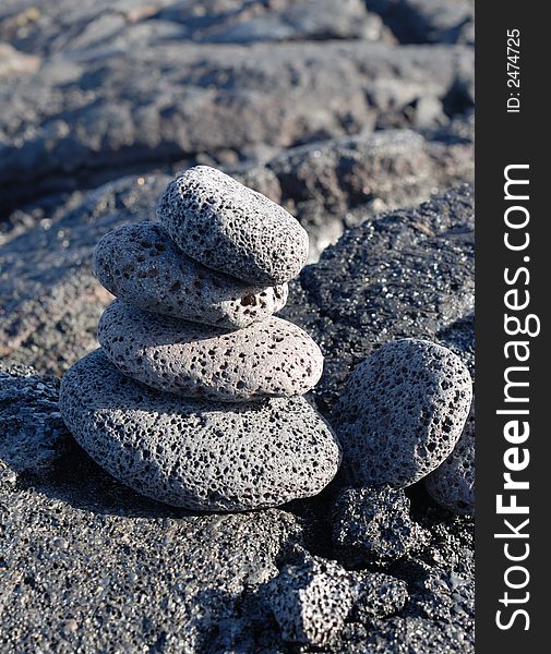 Pile of stacked stones on the beach