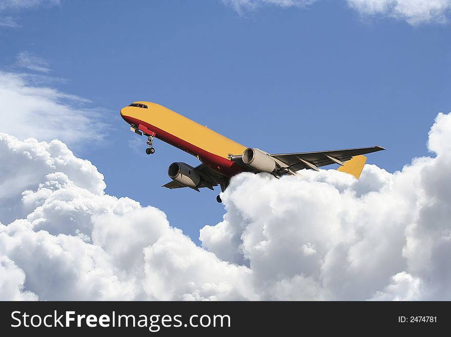 Yellow airliner taking off through the clouds