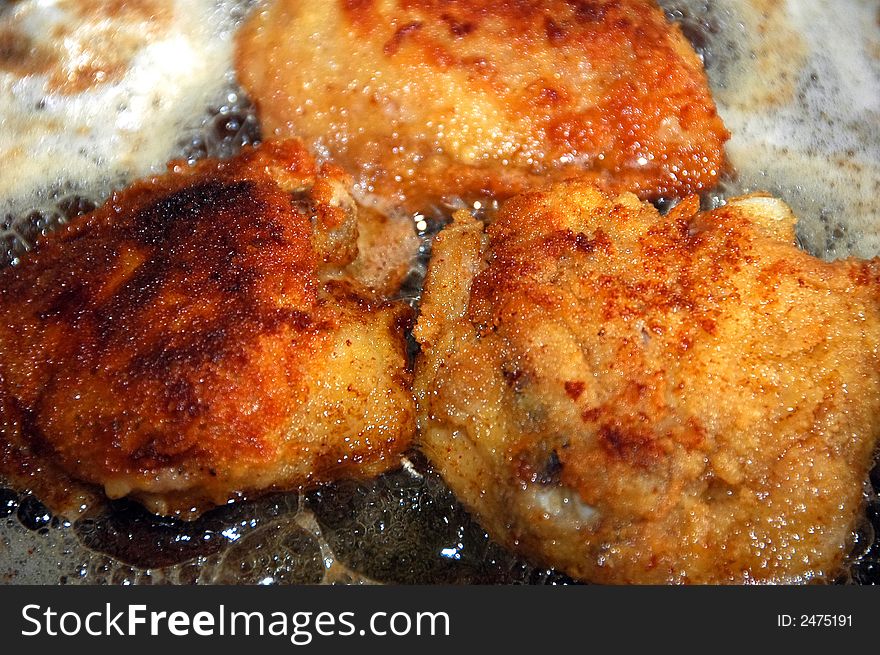 Delicious Frying meat in oil