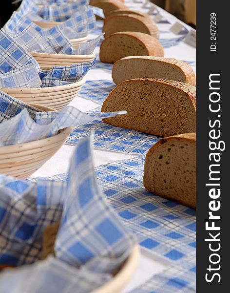 A bread basket filled with bread varieties