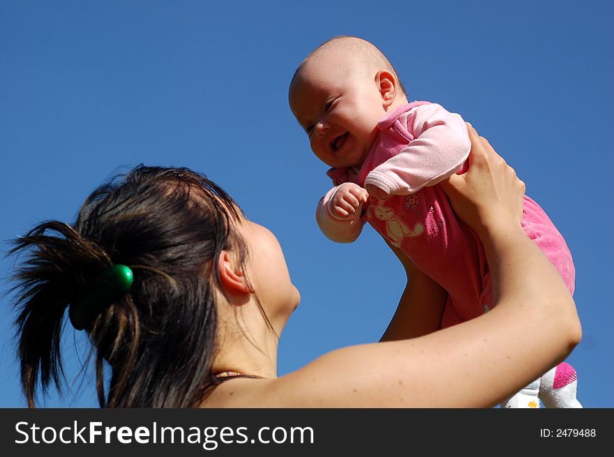 Mother holding newborn baby