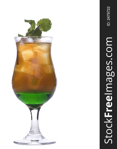 Colorful alcoholic cocktail in a glass against white background. Colorful alcoholic cocktail in a glass against white background