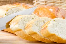 Freshly Baked Baguette Sliced On Cutting Board Royalty Free Stock Photos Freshly Baked Baguette Sliced On Cutting Board Royalty Free Stock Photos