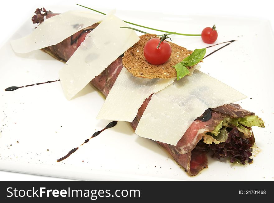 Carpaccio with herbs and cheese on white background