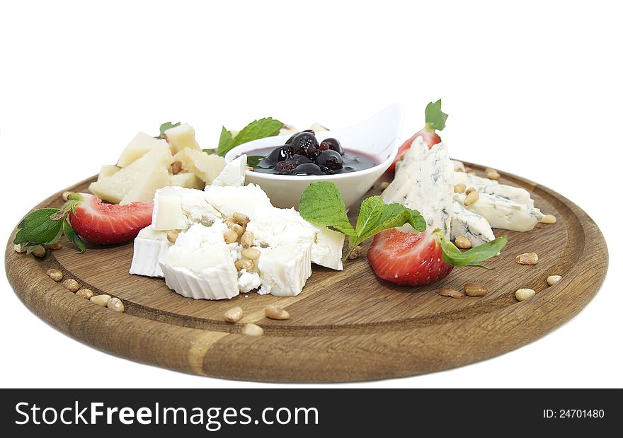 Cheese plate with a large decorated the assortment of mint