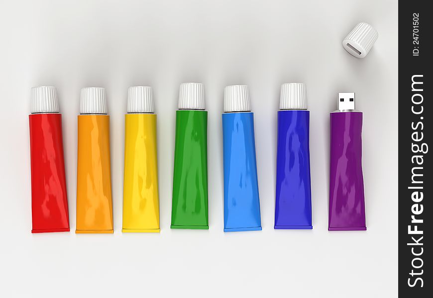 Tubes of paint on a white background in a flash