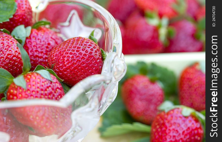 Fresh strawberries in glass bowl