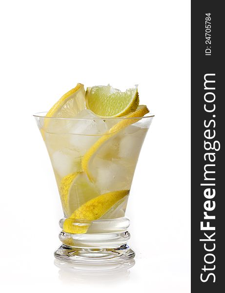 Yellow cocktail with lemon on white background