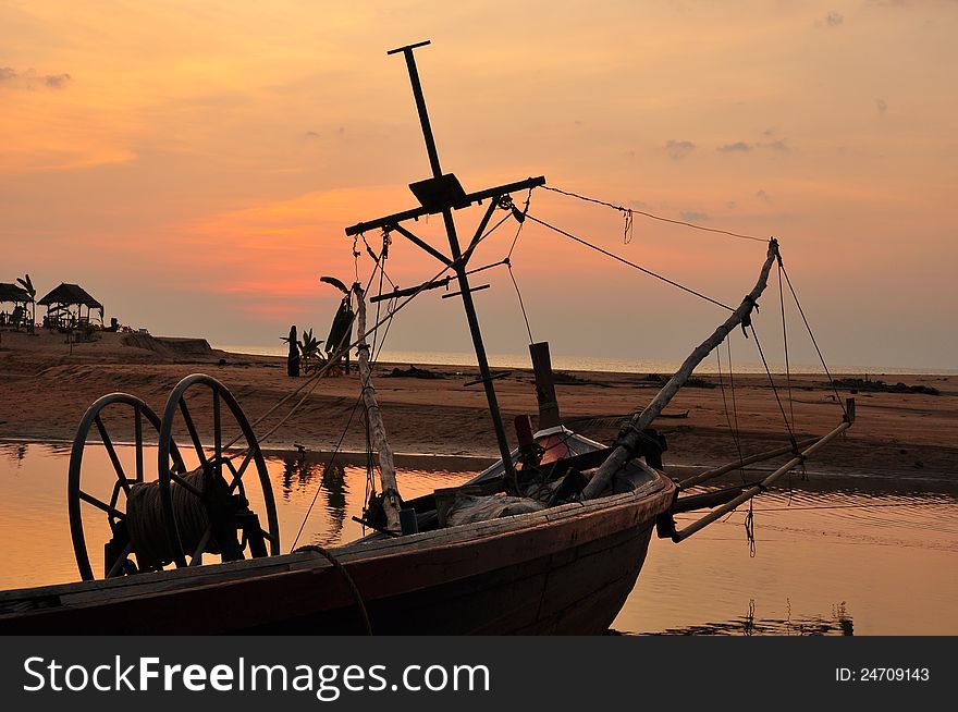 Fishing boat and sunset at Phangnga Thailand