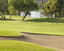 Golf Course With Sandtrap And Lake Stock Photos Golf Course With Sandtrap And Lake Stock Photos