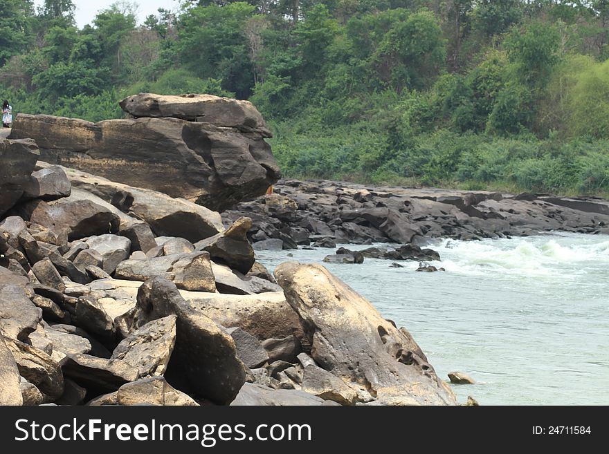 The traces of the river eroded the rock into a beautiful trail along the banks of the Mekong River between Thailand and Laos. The traces of the river eroded the rock into a beautiful trail along the banks of the Mekong River between Thailand and Laos.