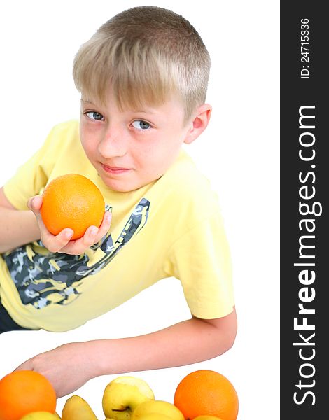 Boy and vegetables isolated background