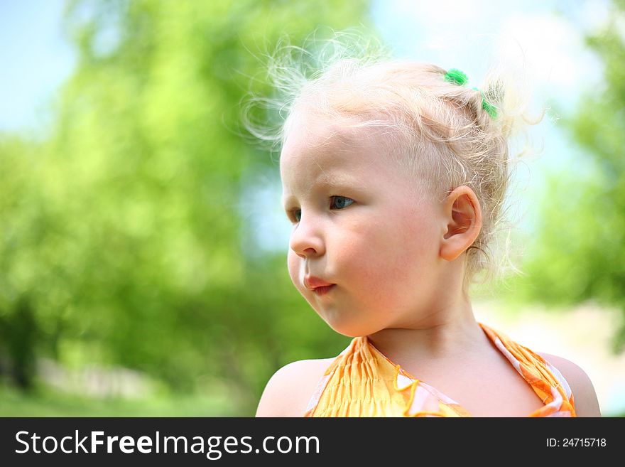 Portrait of blond child in nature