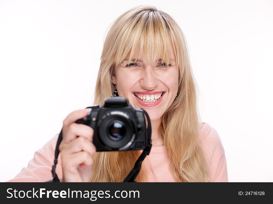 Photographer with photo camera on white