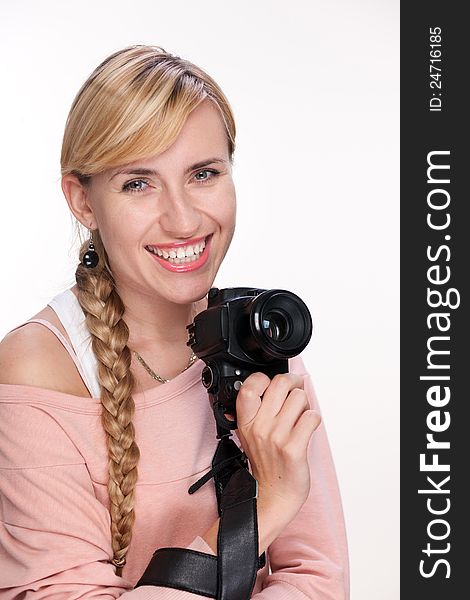 Photographer with photo camera on white