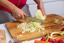 Female Hands Slicing Cabbage Stock Photography Female Hands Slicing Cabbage Stock Photography