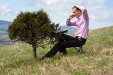 Man With Telephone And Computer On Tree Stock Image Man With Telephone And Computer On Tree Stock Image