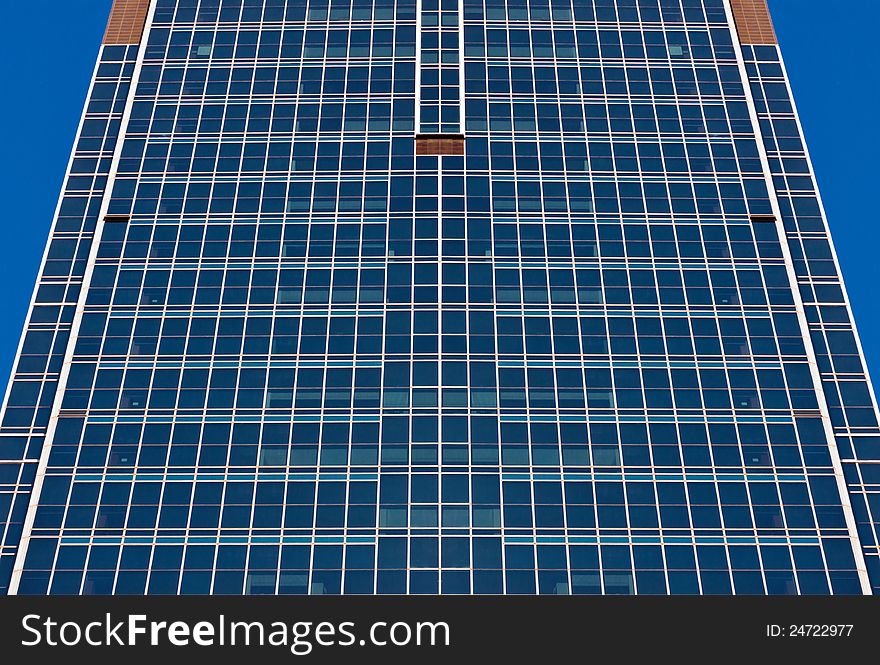 Office building on a blue sky background. Office building on a blue sky background