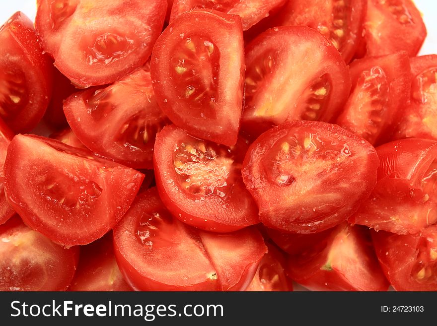 A lot of juicy red tomatoes close-up