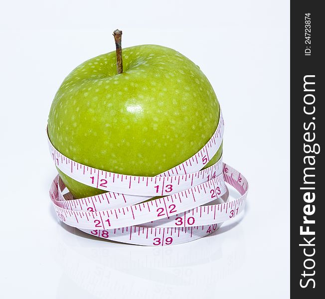 Green Apple And Tape Measure