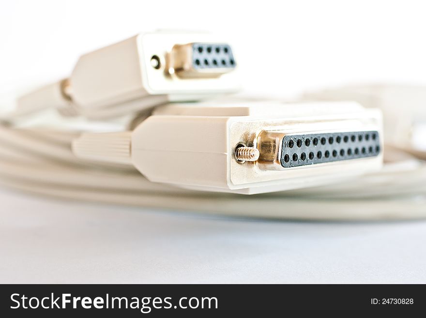 Old-style computer connector plug with cables on white background. Old-style computer connector plug with cables on white background