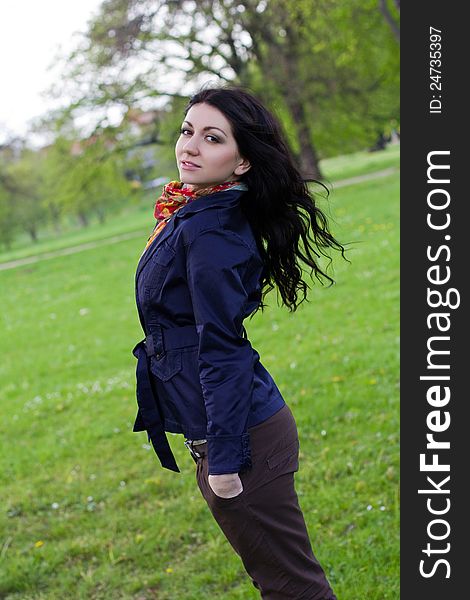 Portrait of carefree young woman in park