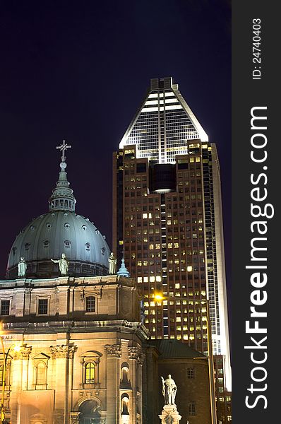 The two elements that controls politics in the world, religion and money represented here by a cathedral and an office building. The two elements that controls politics in the world, religion and money represented here by a cathedral and an office building