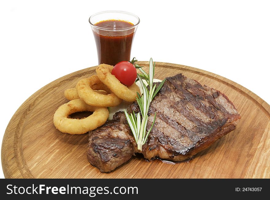 Steak sauce and greens on a white background. Steak sauce and greens on a white background