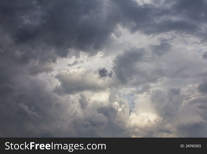 Turbulent clouds that are forming a rain storm. Turbulent clouds that are forming a rain storm.