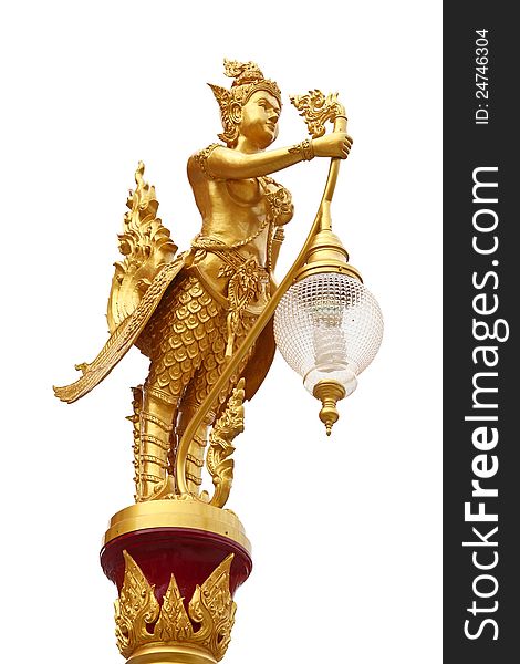 Mythical female bird called Kinnaree holding lamp in the temple with white background, Thailand. This image contain clipping path